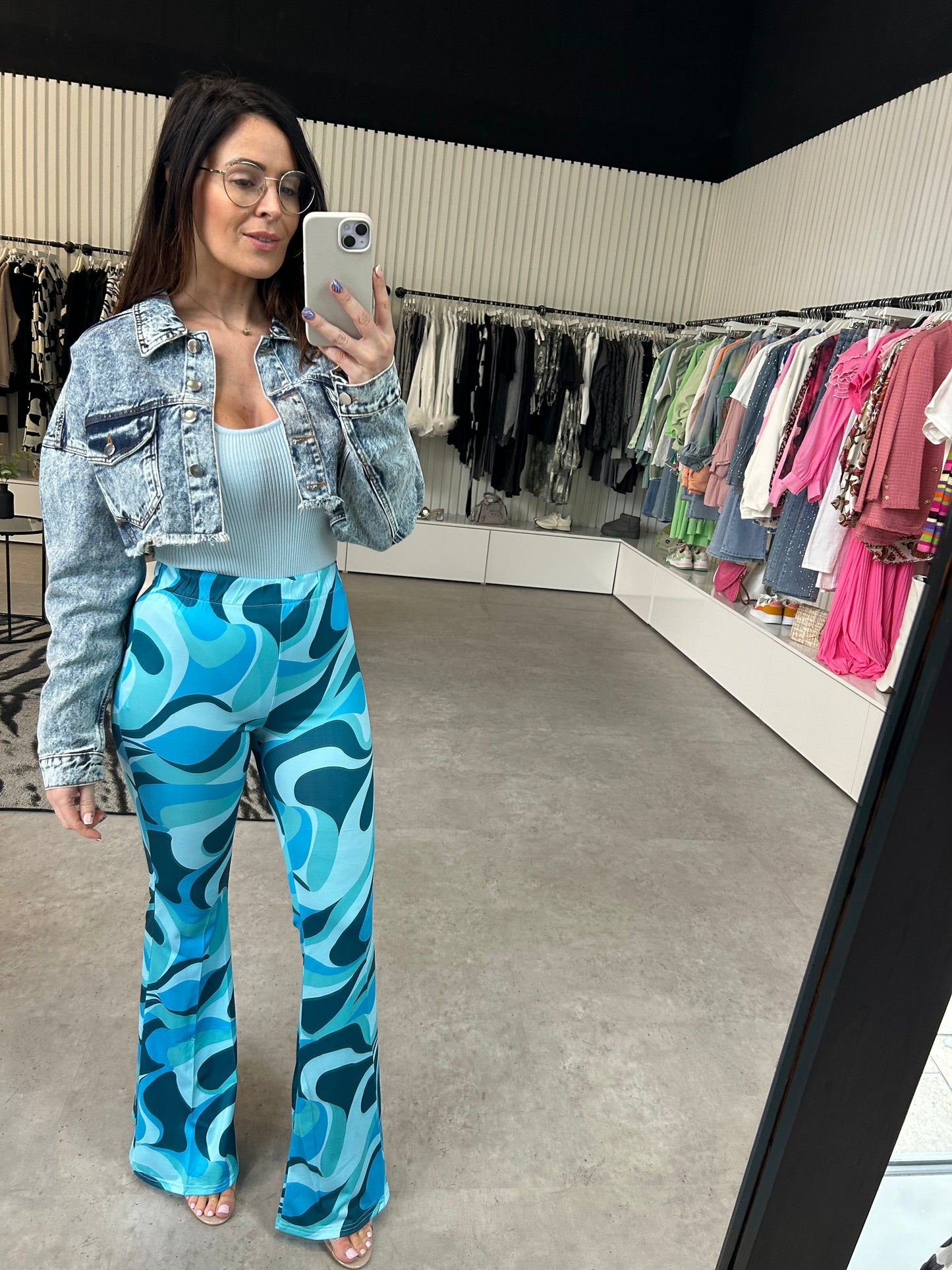 ‘JENNA’ flared swirl print trousers