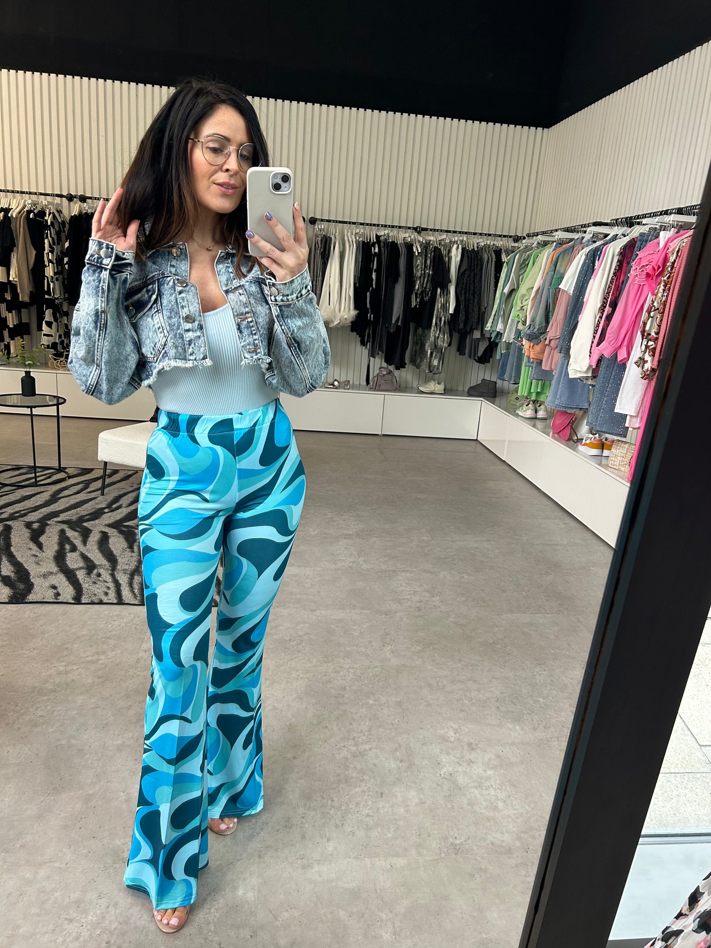 ‘JENNA’ flared swirl print trousers