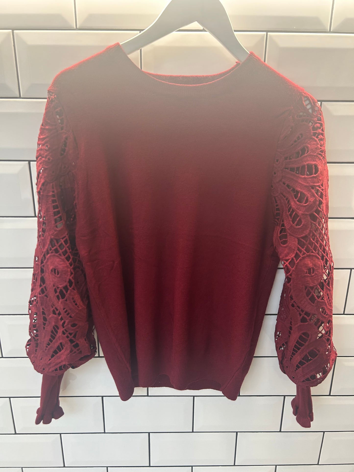 Lightweight knit sweater with lace embroidered sleeves