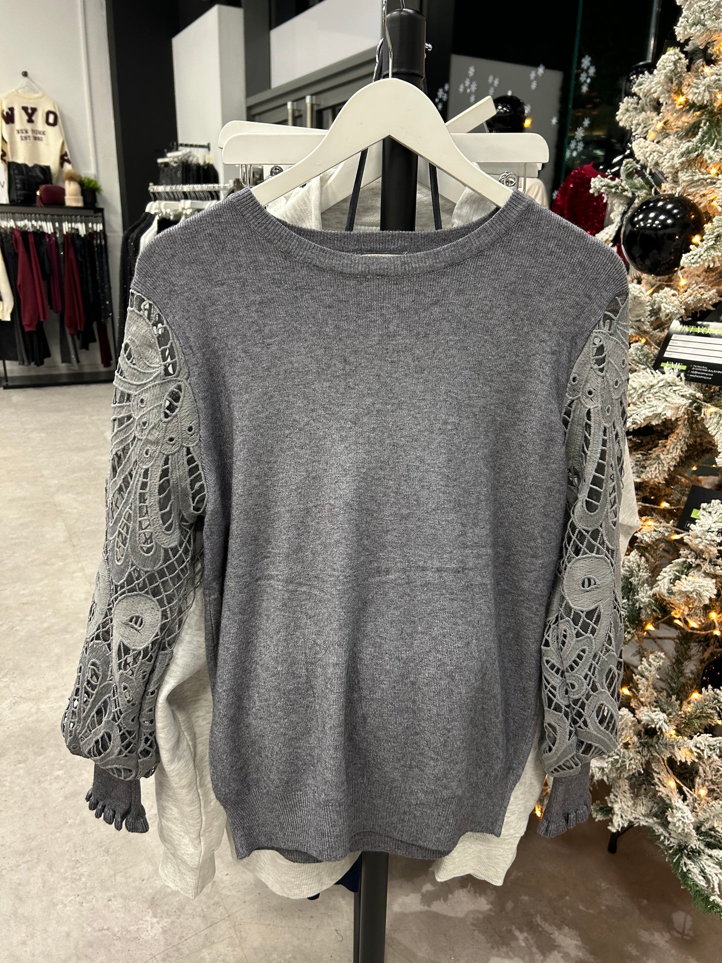 Lightweight knit sweater with lace embroidered sleeves